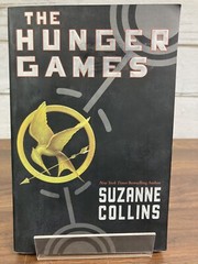 The Hunger Games Book Paperback By Suzanne Collins 1st Scholastic Edition 2009