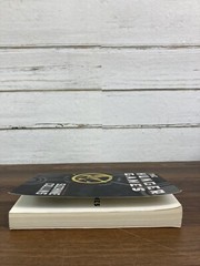 The Hunger Games Book Paperback By Suzanne Collins 1st Scholastic Edition 2009