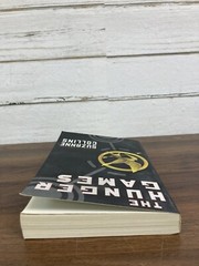 The Hunger Games Book Paperback By Suzanne Collins 1st Scholastic Edition 2009