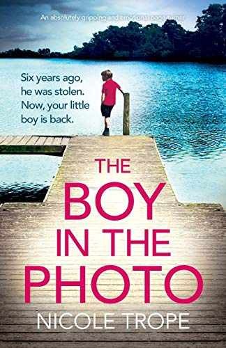 The Boy in the Photo: An absolutely – Paperback, by Trope Nicole – Acceptable