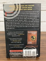 The Hunger Games Book Paperback By Suzanne Collins 1st Scholastic Edition 2009